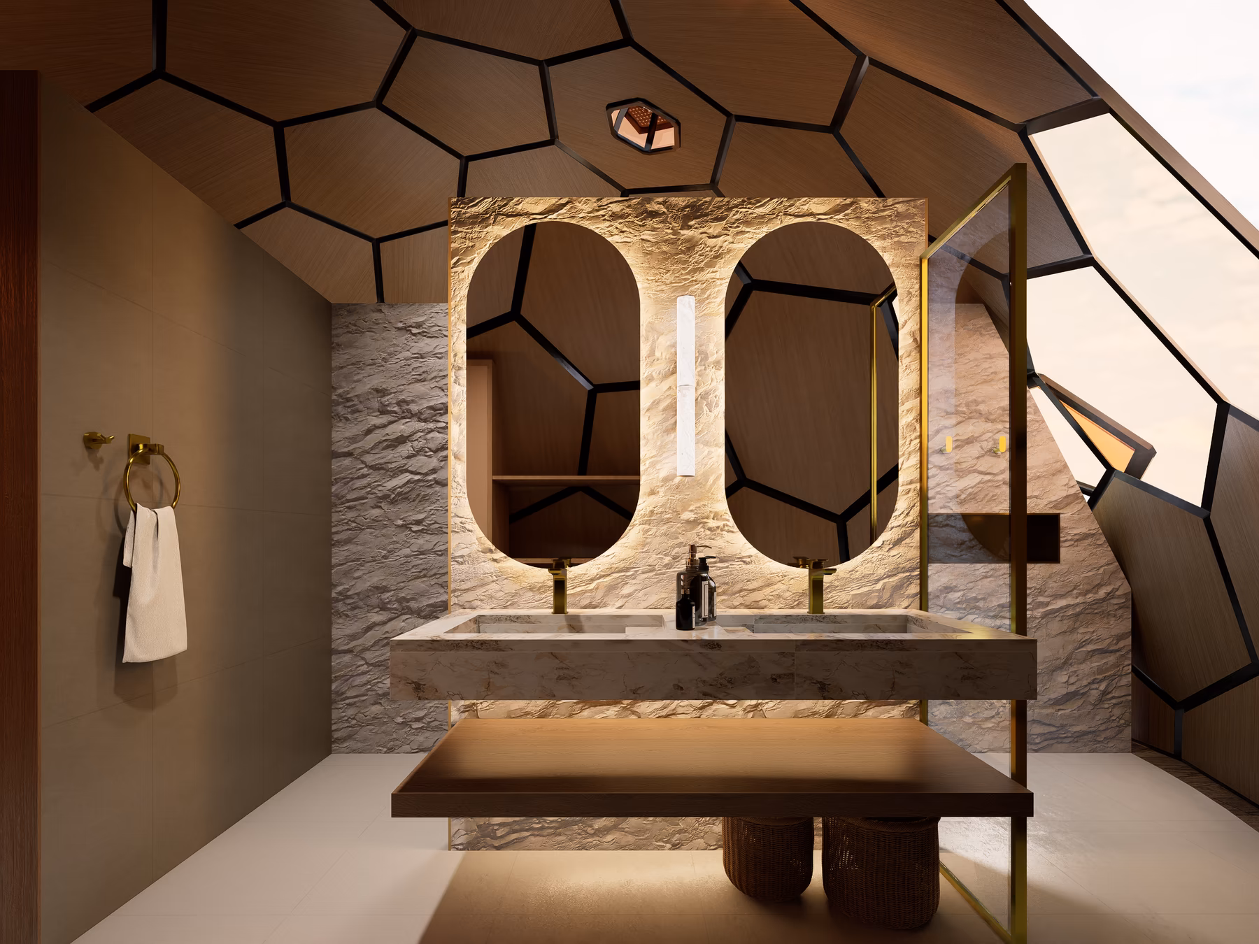 Double vanity with two backlit oval mirrors against a stone wall