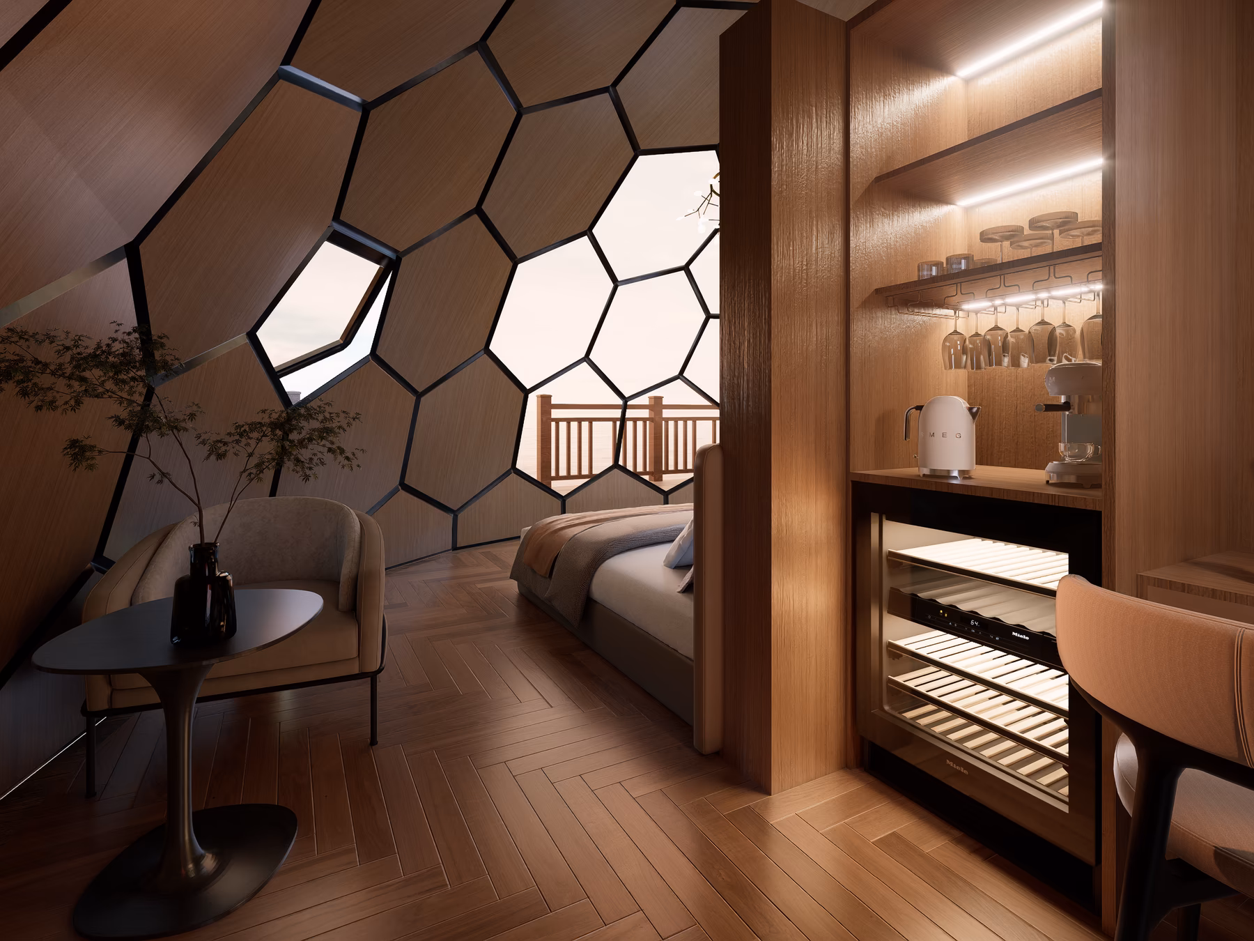 A lounge chair and side table by the glass shell, a bed nook and wine fridge beyond